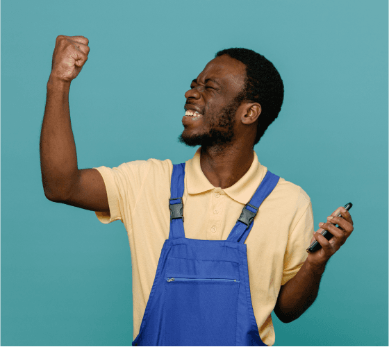 Man holding fist and phone